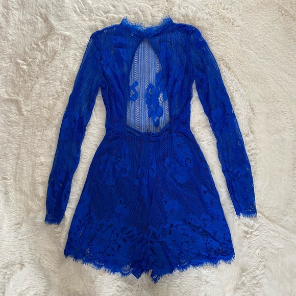 Charlotte Russe - Cobalt Blue Floral Lace Long Sleeve Open Back Bodycon Romper - Picture 7 of 10